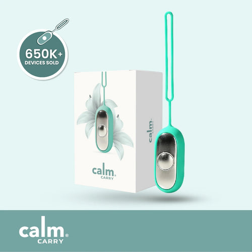 Teal CalmCarry device with packaging on a light blue background